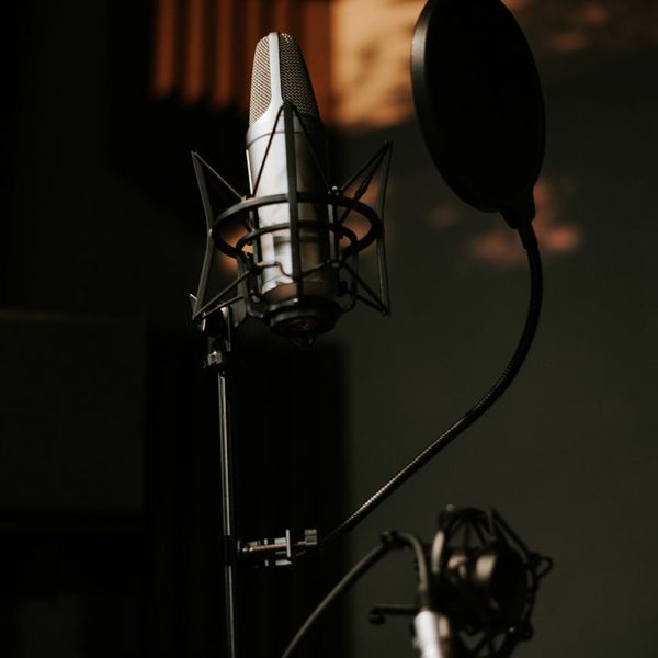 Modern minimalist cardio equipment in a dimly lit studio